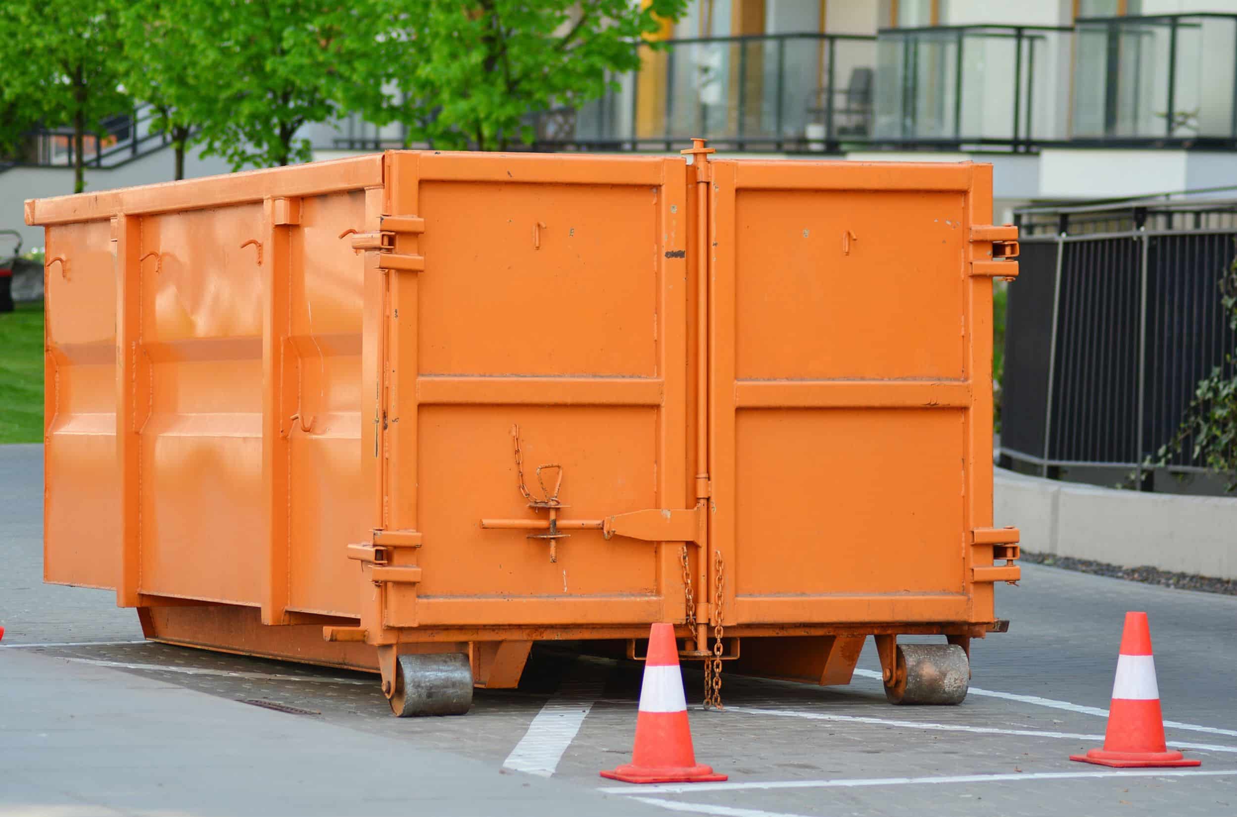 a orange container on wheels